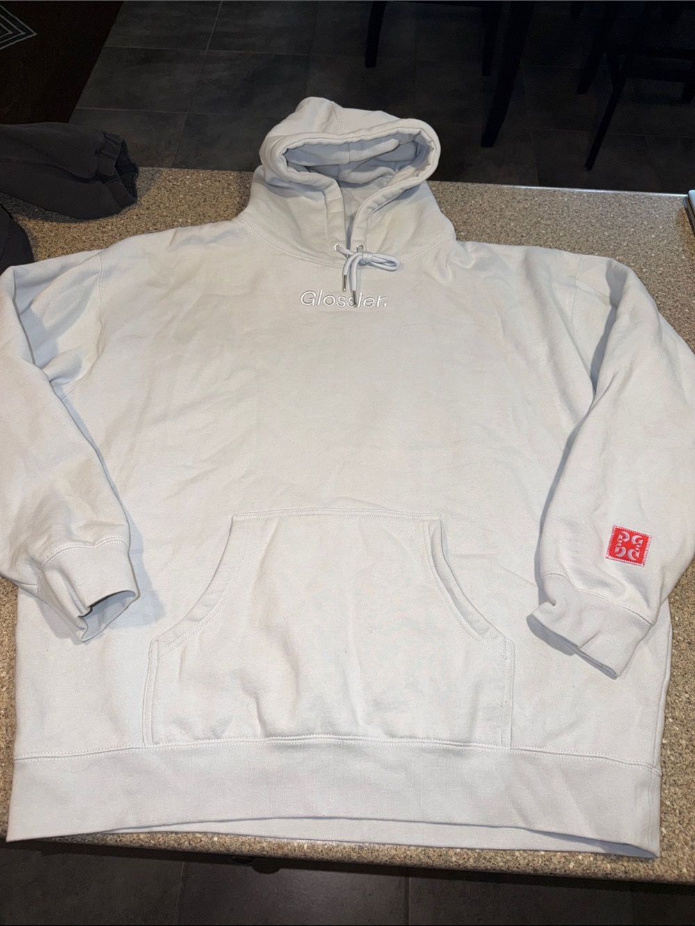 Glossier Baby Blue Logo Hoodie with Pink Sleeve Patch